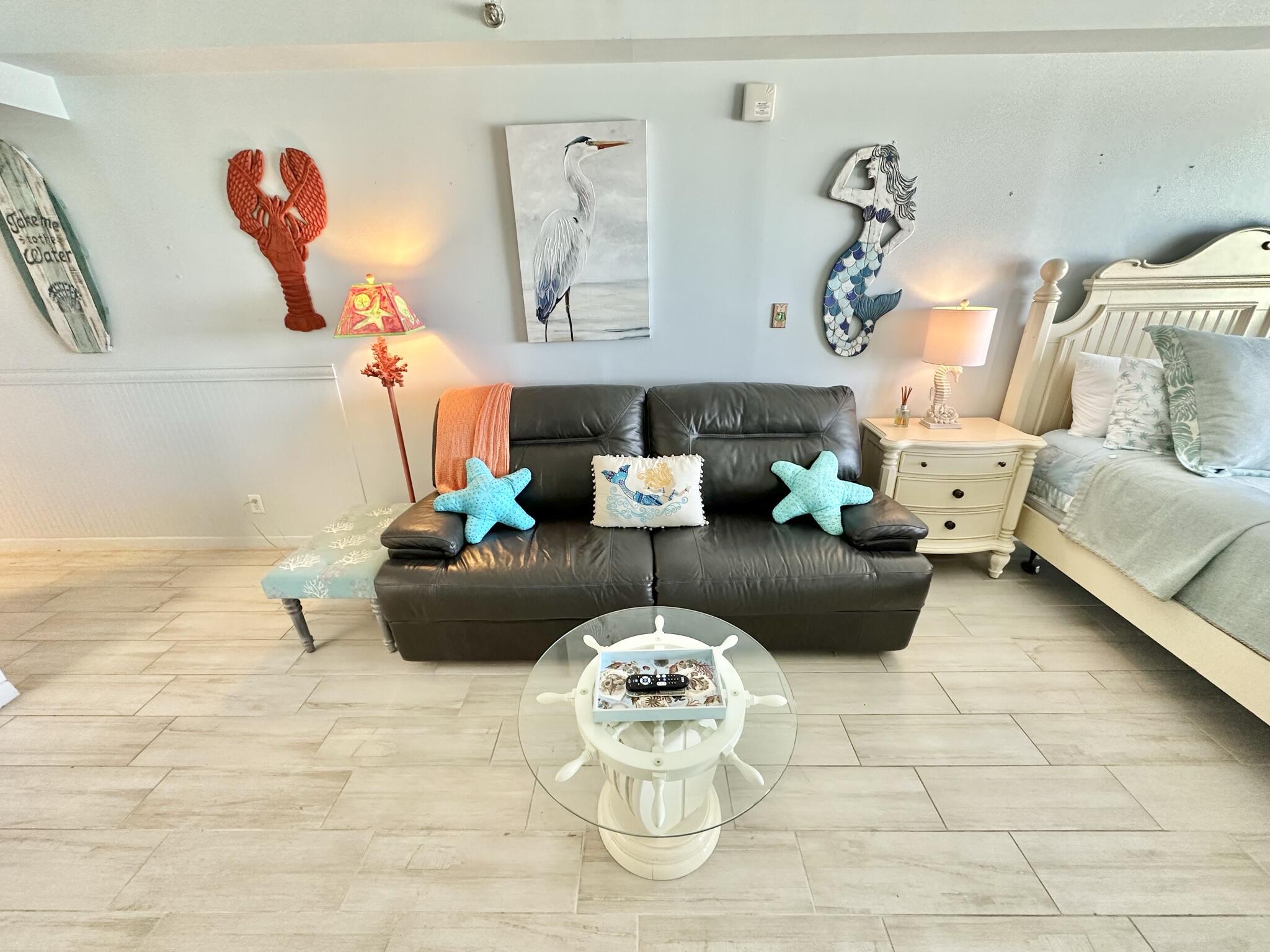 4280 Beachside 2, Unit 280 Miramar Beach, FL 32550 - Photo 7 of 34 a living room with furniture and a table