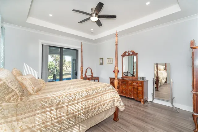 a living room with furniture and a dining table
