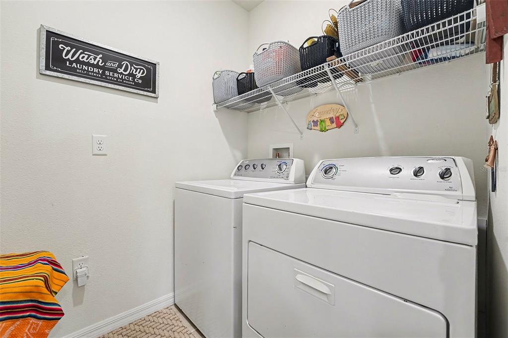 2756 Grandbury Grove Road Lakeland, FL 33811 - Photo 19 of 27 a utility room with dryer and washer