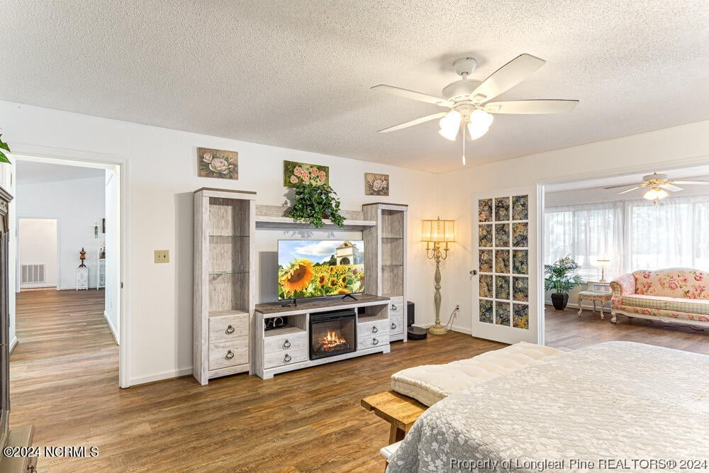 Undisclosed Address West End, NC 27376 - Photo 23 of 49 a living room with furniture and a flat screen tv