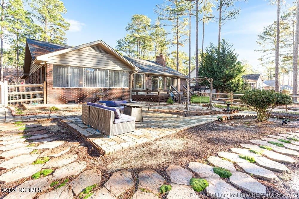 Undisclosed Address West End, NC 27376 - Photo 35 of 49 a front view of a house with a yard