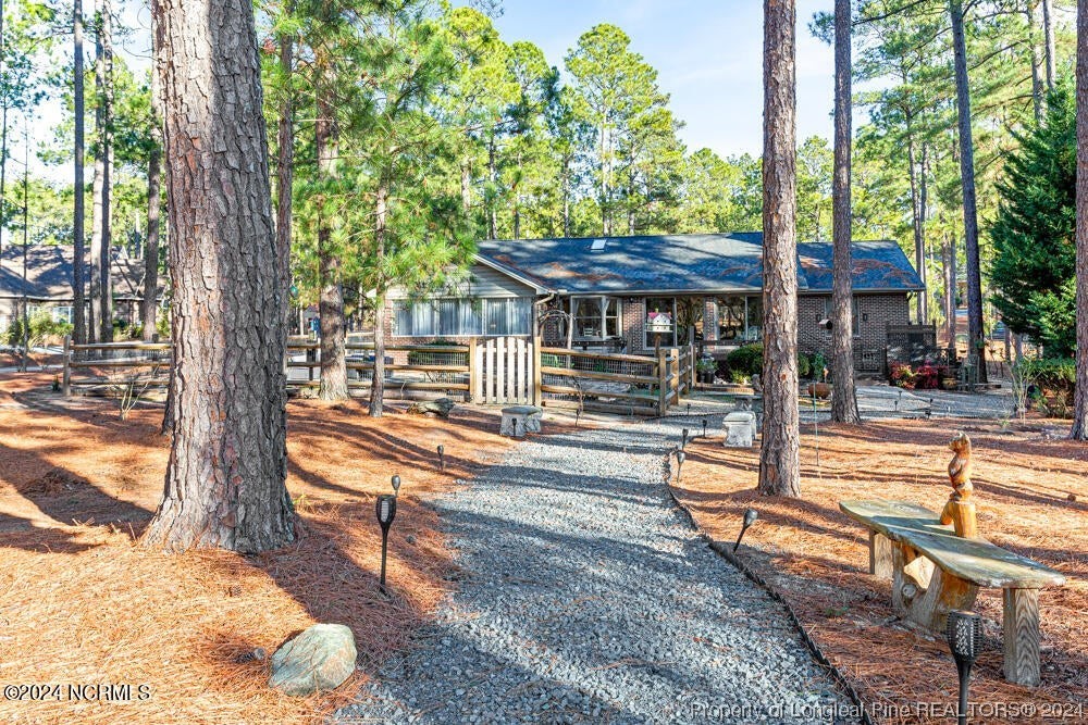 Undisclosed Address West End, NC 27376 - Photo 41 of 49 a view of a house with backyard and sitting area