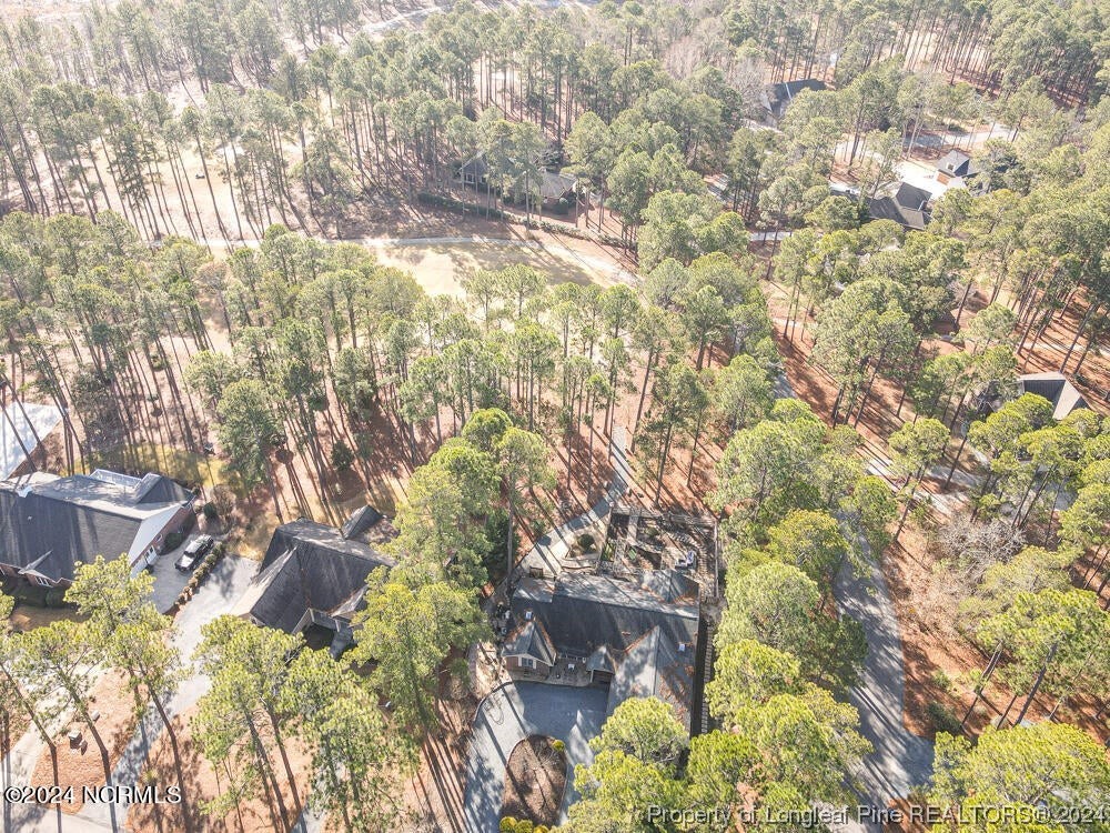 Undisclosed Address West End, NC 27376 - Photo 44 of 49 a backyard of a house with yard and outdoor seating