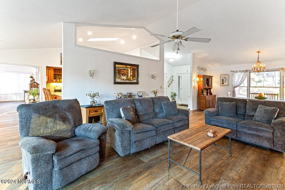 Undisclosed Address West End, NC 27376 - Photo 8 of 49 a living room with furniture and a large window