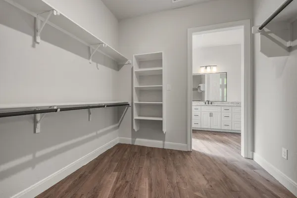 a view of an empty walk in closet