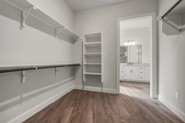 a view of an empty walk in closet