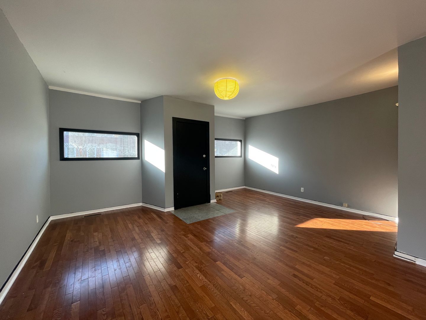 1819 South May Street, Unit 1 Chicago, IL 60608 - Photo 3 of 7 a view of empty room with wooden floor