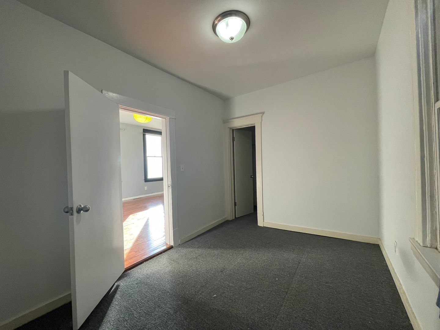 1819 South May Street, Unit 1 Chicago, IL 60608 - Photo 4 of 7 an empty room with windows