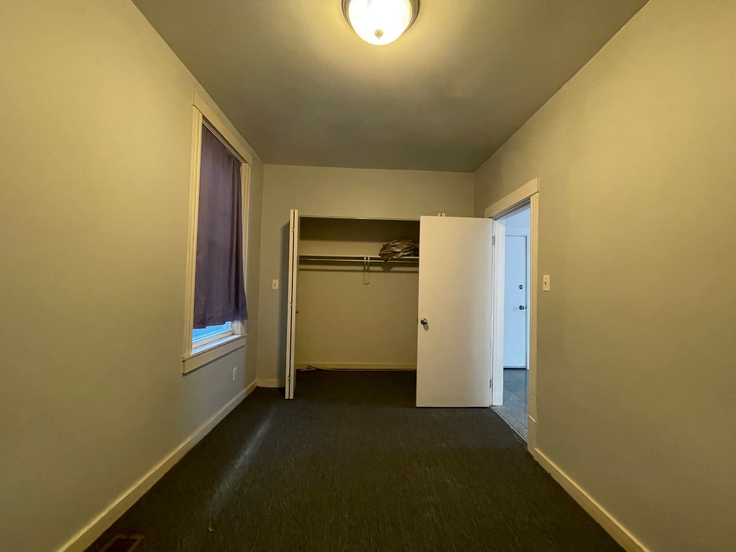 1819 South May Street, Unit 1 Chicago, IL 60608 - Photo 6 of 7 a view of an empty room with a window