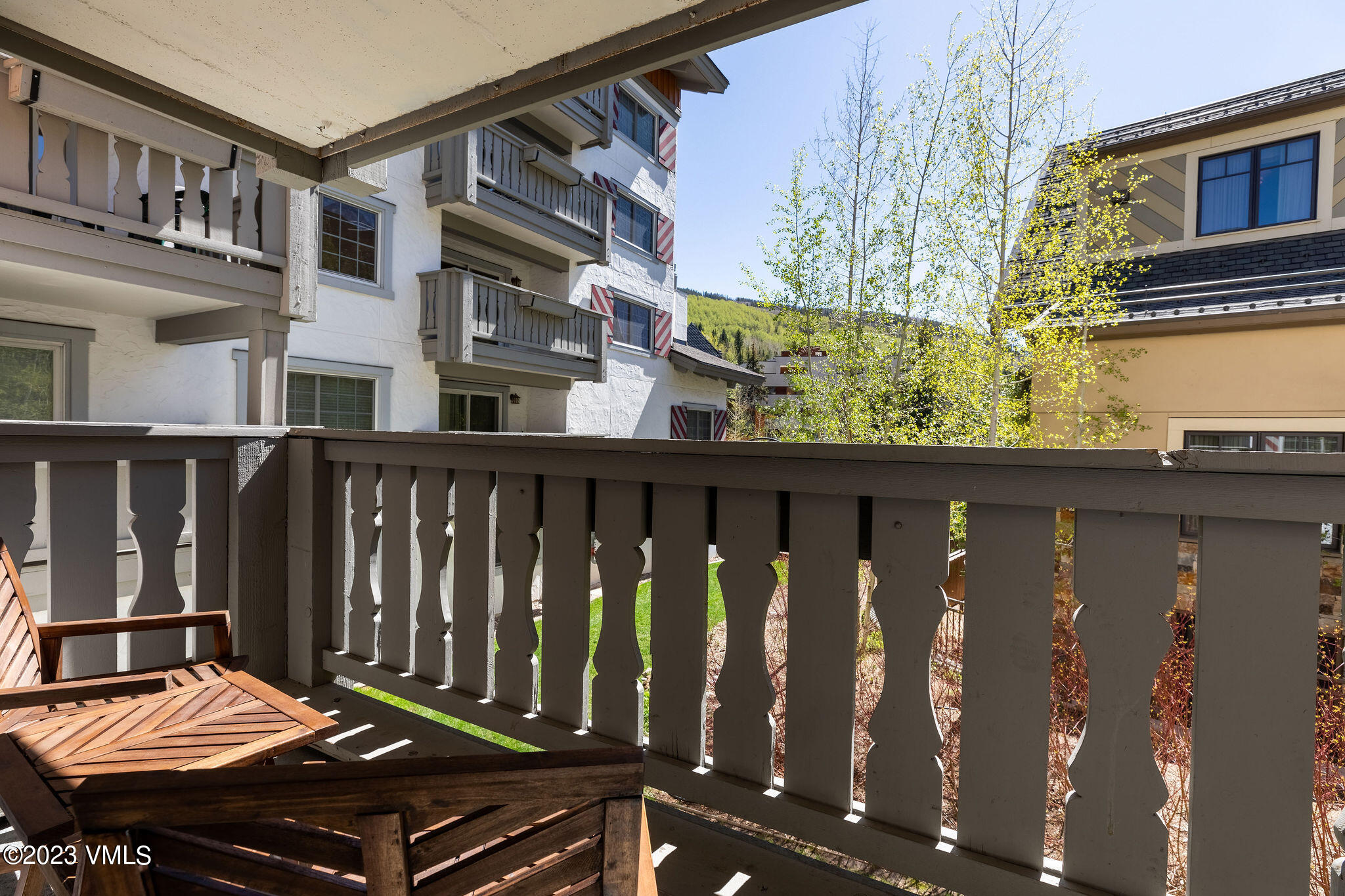 9 Vail Road, Unit 1G Vail, CO 81657 - Photo 9 of 9 a view of a balcony with chairs
