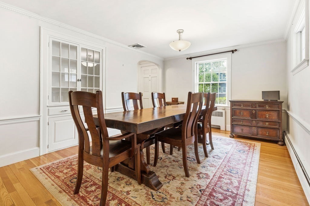 57 Douglas Road Needham, MA 02492 - Photo 9 of 22 a view of a dining room with furniture