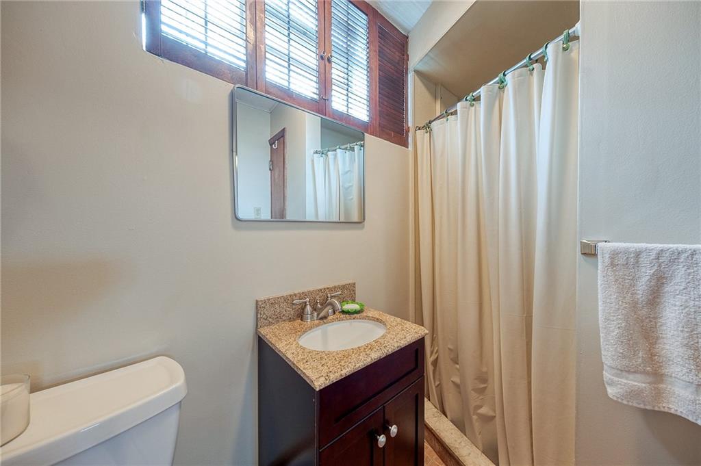 36 Roxbury Road Pittsburgh, PA 15221 - Photo 18 of 24 A spacious shower stall, updated vanity, and the bathroom's neutral color creates a clean and inviting atmosphere, making it a functional and efficient space for daily use.