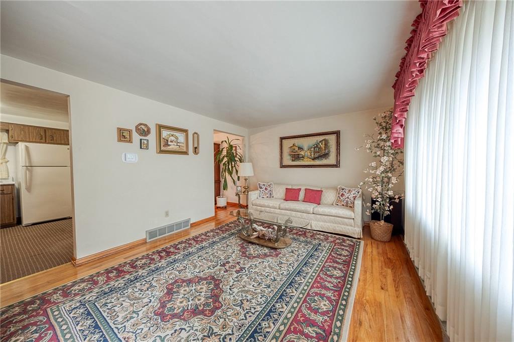 36 Roxbury Road Pittsburgh, PA 15221 - Photo 2 of 24 Living room has hard wood floors.