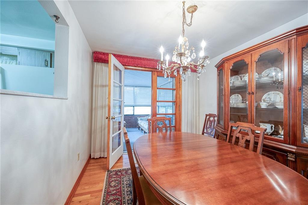 36 Roxbury Road Pittsburgh, PA 15221 - Photo 4 of 24 Enjoy eating in the dining room or step out onto the Sun room.