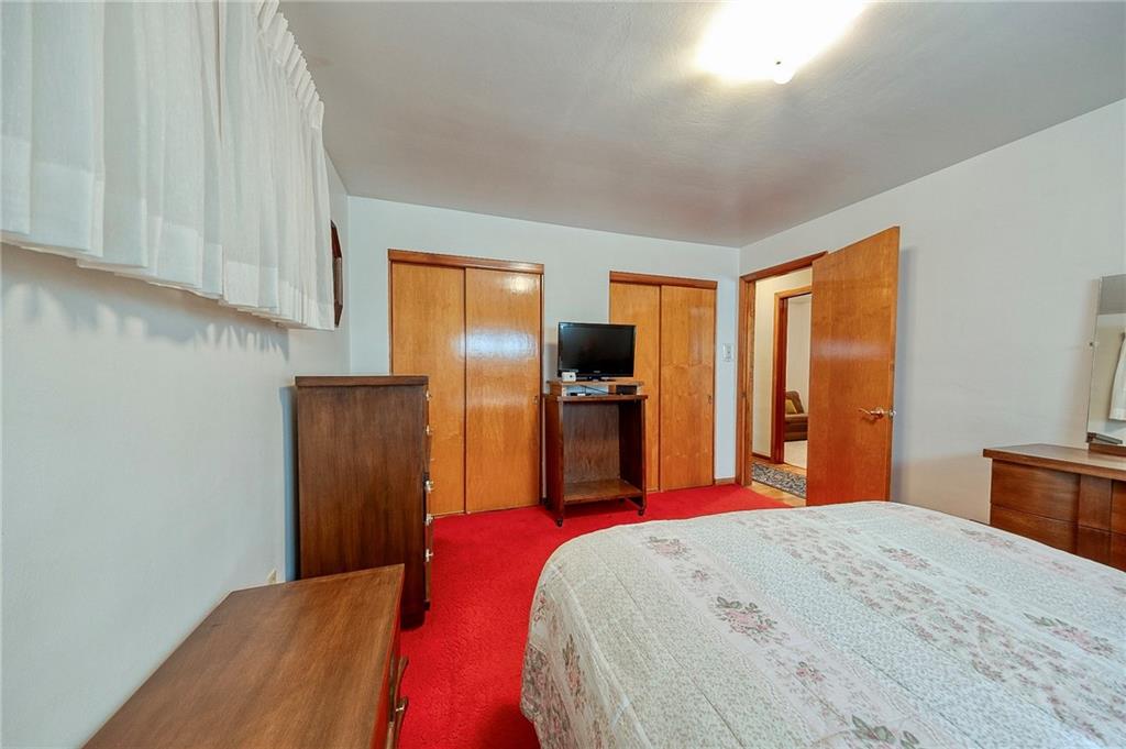 36 Roxbury Road Pittsburgh, PA 15221 - Photo 10 of 24 The primary bedroom offers double closets.