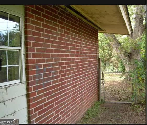 a view of a brick wall