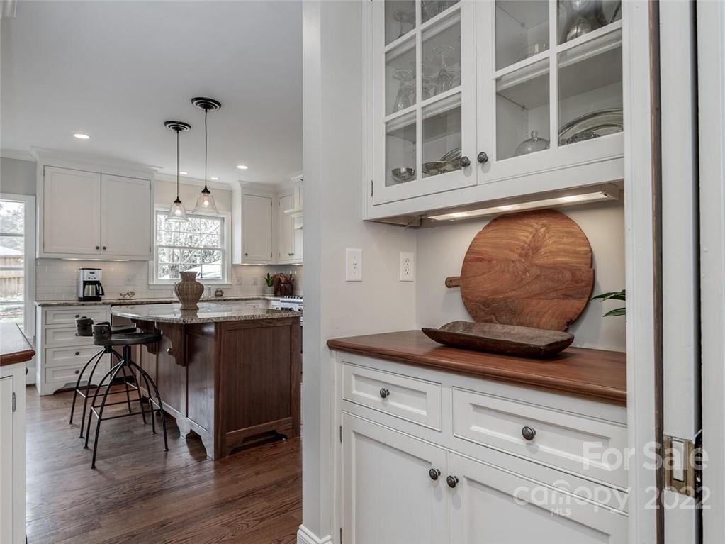 416 Whitestone Road Charlotte, NC 28270 - Photo 15 of 28 a kitchen with a refrigerator and a stove top oven