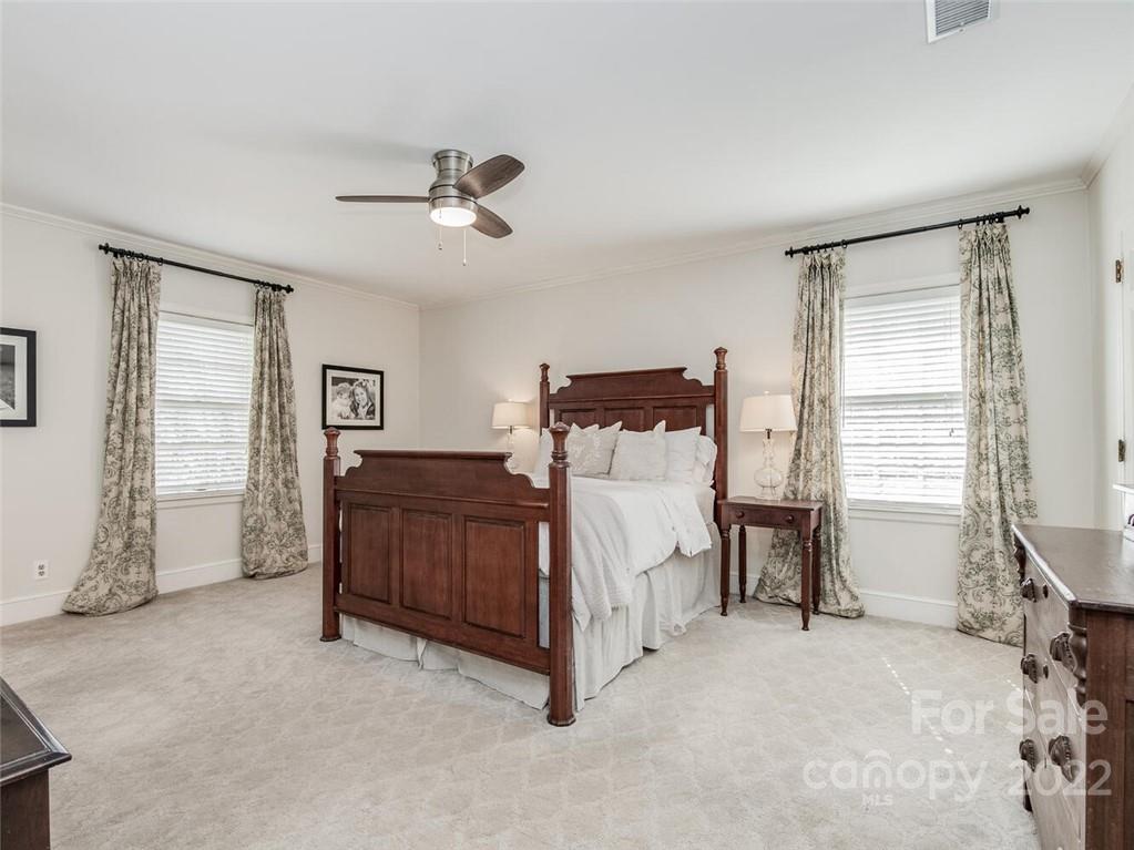 416 Whitestone Road Charlotte, NC 28270 - Photo 19 of 28 a bed room with a bed and a chair