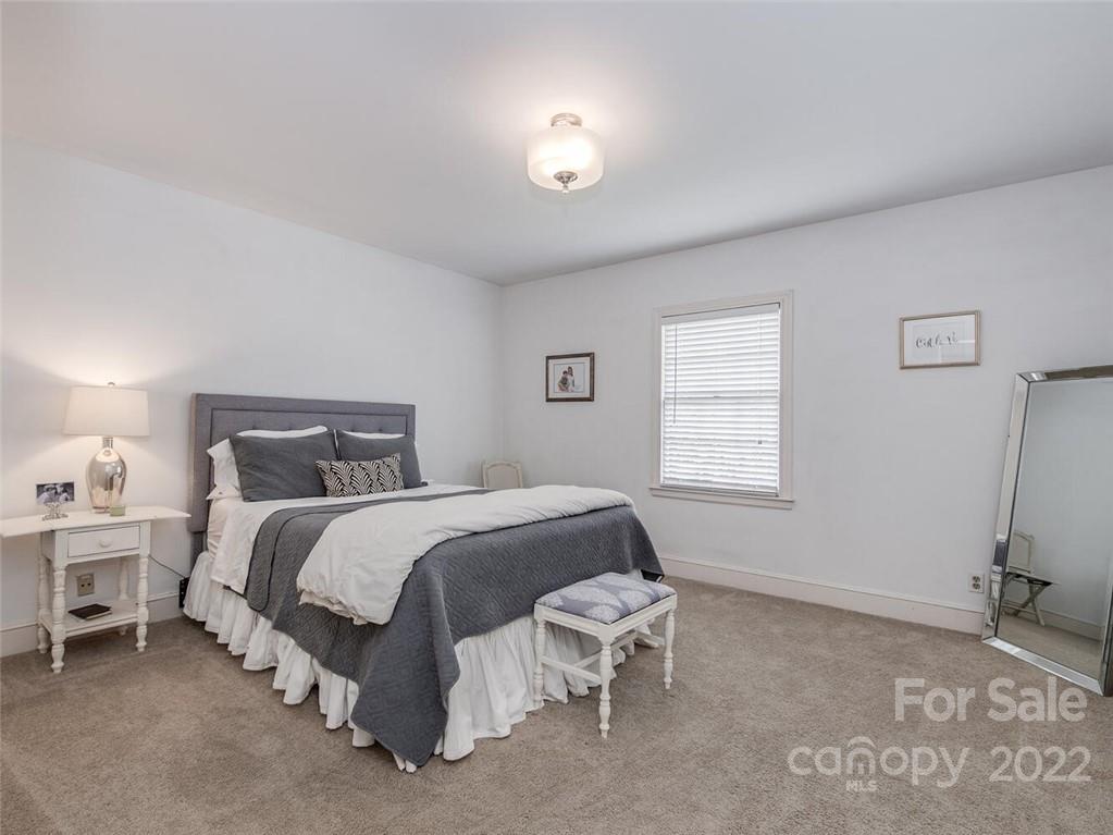 416 Whitestone Road Charlotte, NC 28270 - Photo 24 of 28 a bed room with a bed and a window