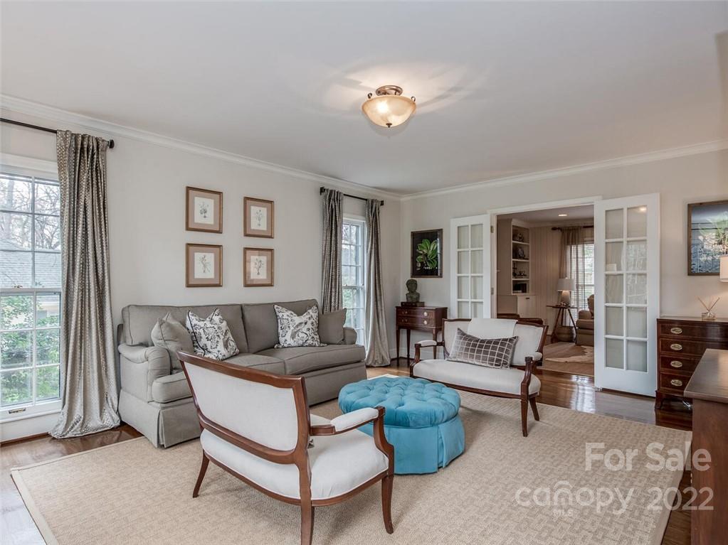 416 Whitestone Road Charlotte, NC 28270 - Photo 5 of 28 a living room with furniture and a fireplace