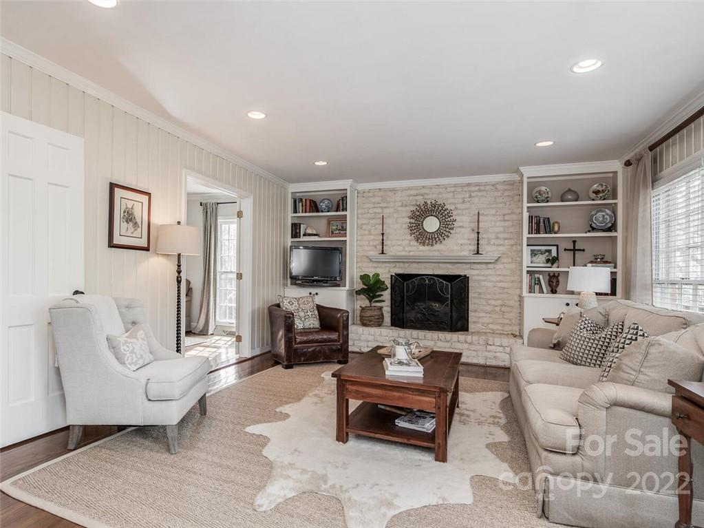 416 Whitestone Road Charlotte, NC 28270 - Photo 9 of 28 a living room with furniture and a fireplace