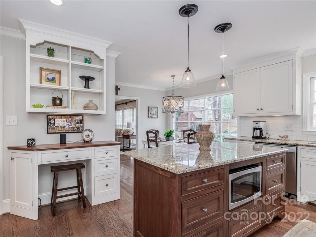 416 Whitestone Road Charlotte, NC 28270 - Photo 10 of 28 a kitchen with a stove a sink and cabinets