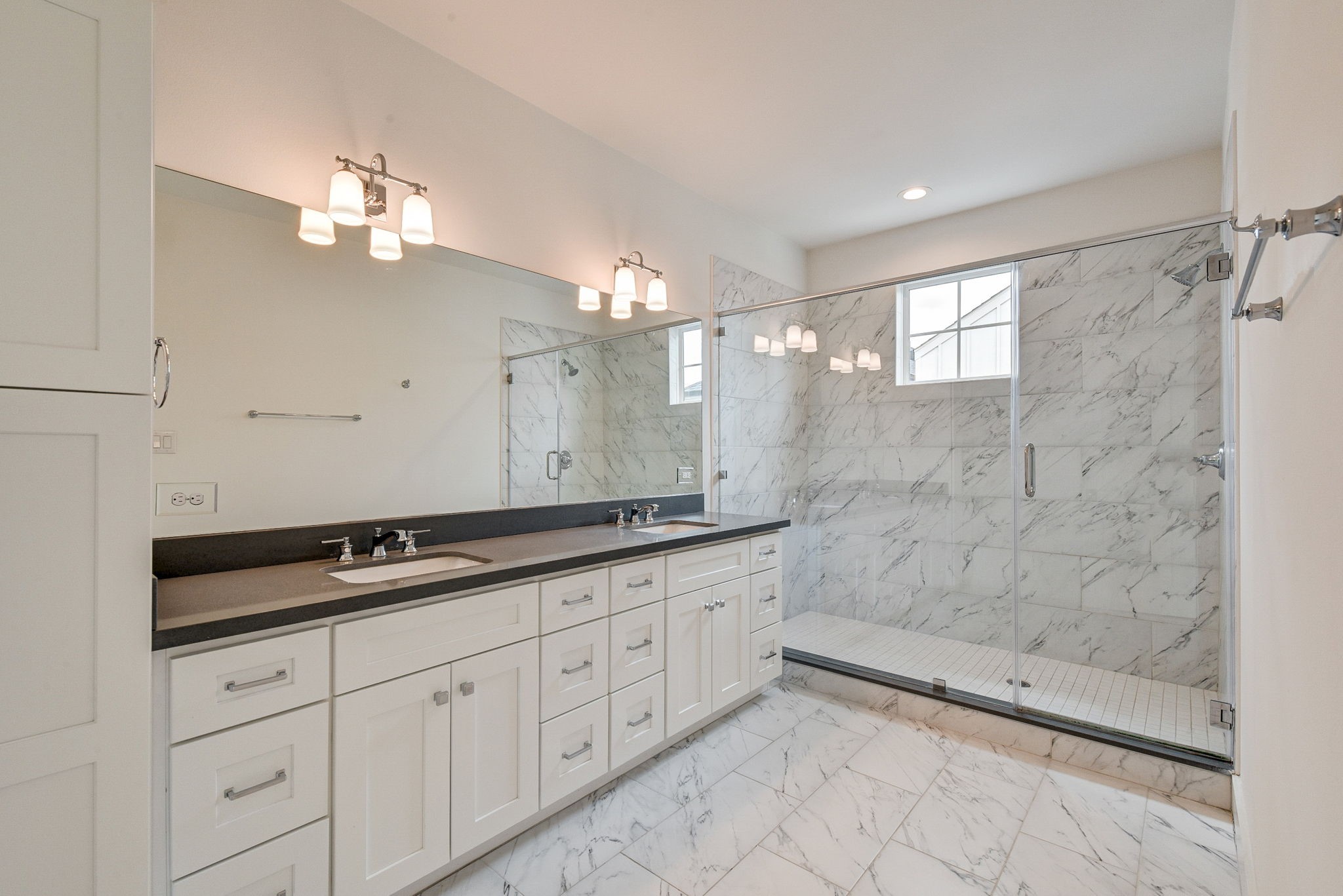 2575 Judiway Street Houston, TX 77018 - Photo 8 of 48 a bathroom with a double vanity sink and a mirror