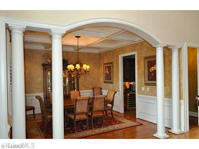7045 Denison Road Summerfield, NC 27358 - Photo 2 of 16 Dining Room. The gently arched opening of this gracious dining room is supported by classic columns.