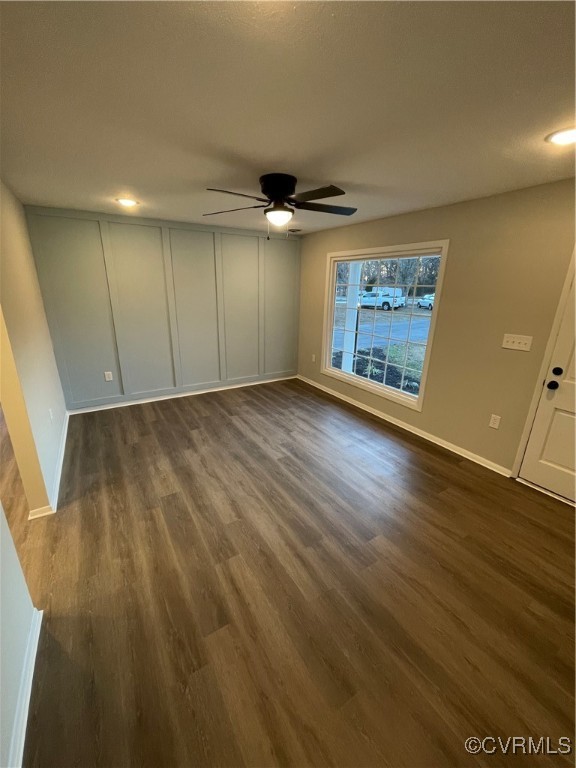 7617 Strath Road Henrico, VA 23231 - Photo 12 of 25 an empty room with wooden floor and windows