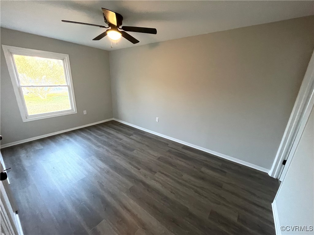 7617 Strath Road Henrico, VA 23231 - Photo 23 of 25 wooden floor in an empty room with a window