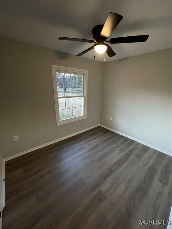 7617 Strath Road Henrico, VA 23231 - Photo 24 of 25 an empty room with wooden floor fan and windows