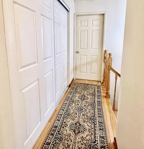 an entryway with a rug