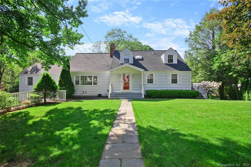 23 Crimmins Road Darien, CT 06820 - Photo 1 of 1 a front view of a house with yard