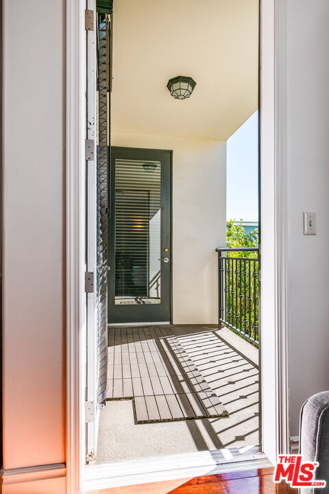 4724 Kester Avenue, Unit 209 Sherman Oaks, CA 91403 - Photo 18 of 27 a view of a balcony from door