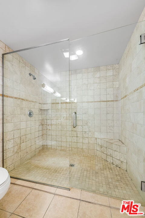 4724 Kester Avenue, Unit 209 Sherman Oaks, CA 91403 - Photo 23 of 27 a bathroom with a shower