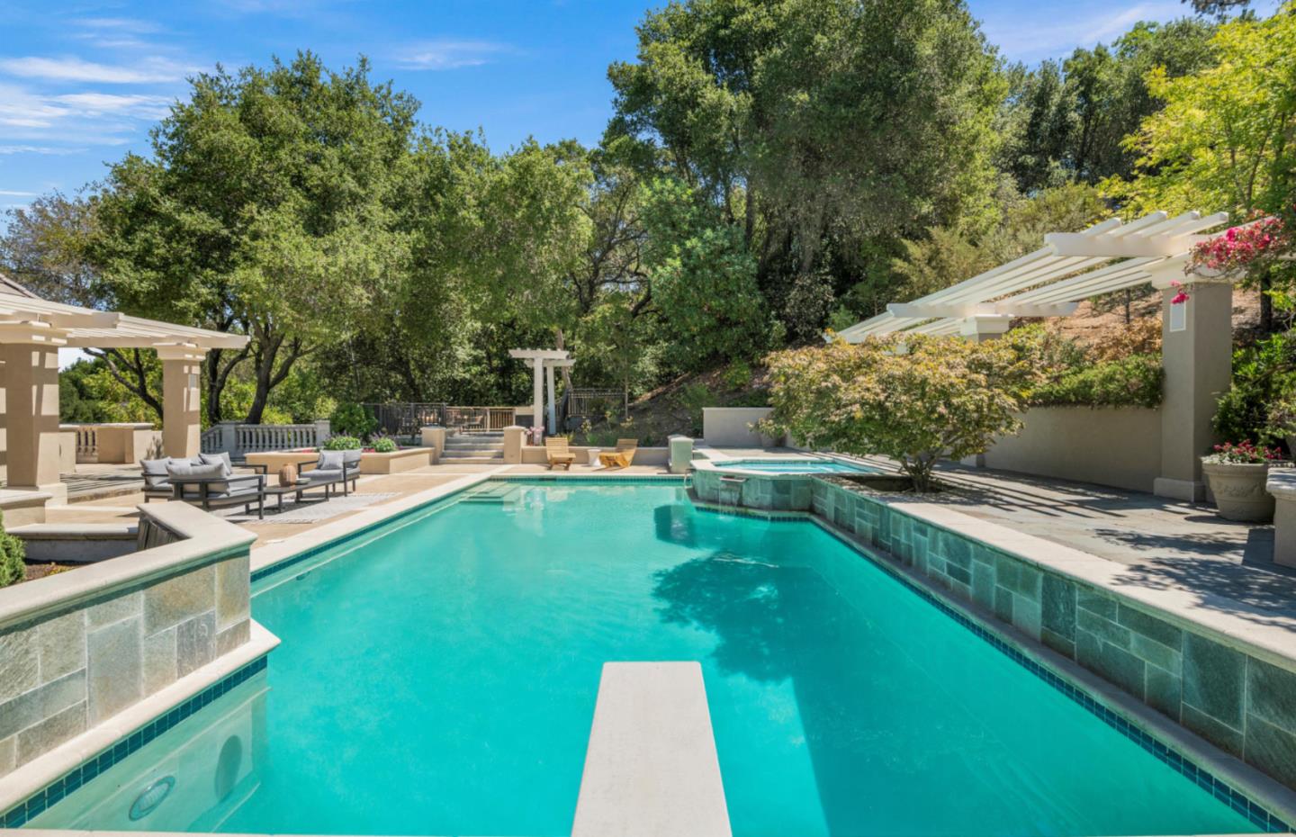 14113 Pike Road Saratoga, CA 95070 - Photo 63 of 78 a view of a swimming pool with a patio