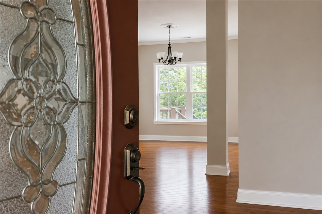 190 Fred Bradford Road Iva, SC 29655 - Photo 6 of 32 Step inside to gleaming hardwood floors and abundant natural light in this inviting open space.