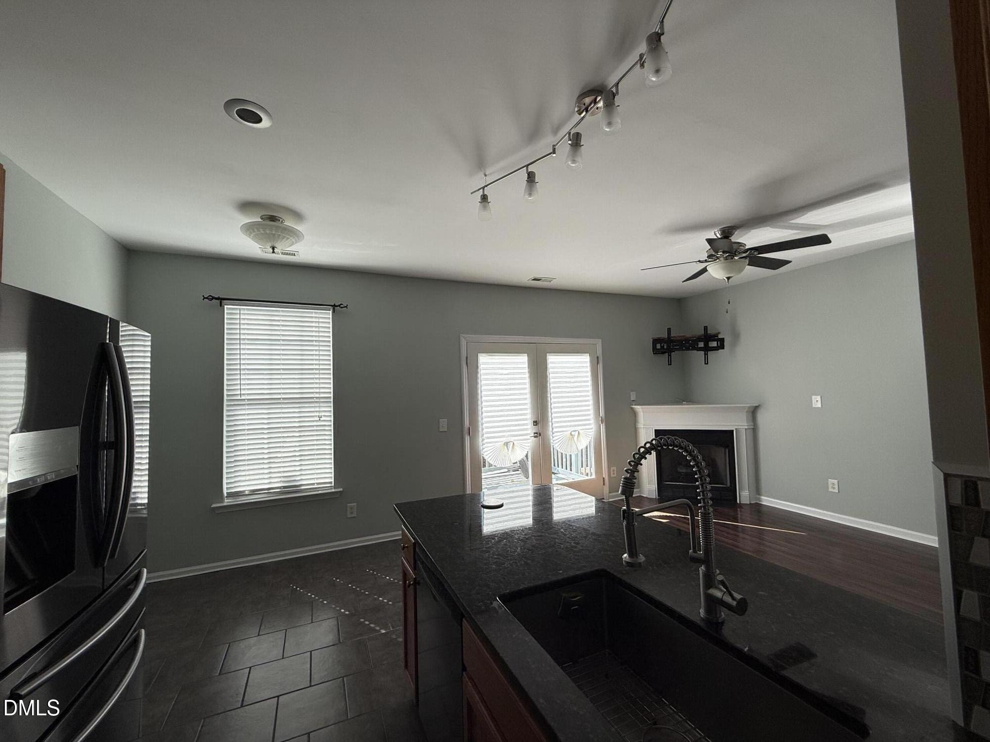 606 Sawcut Lane Apex, NC 27502 - Photo 13 of 30 a view of a livingroom with furniture and a window