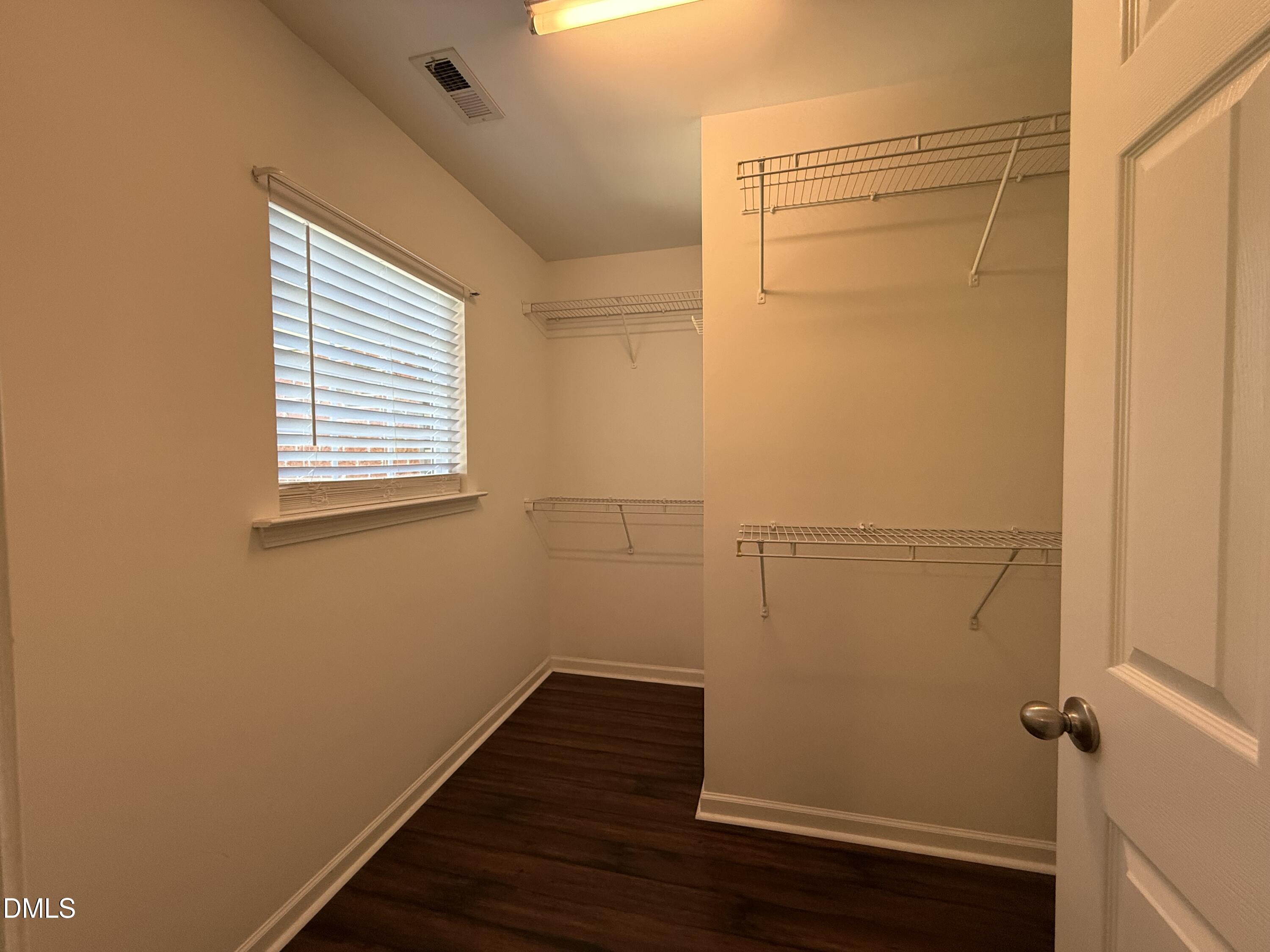 606 Sawcut Lane Apex, NC 27502 - Photo 18 of 30 a view of small space with wooden floor and a window