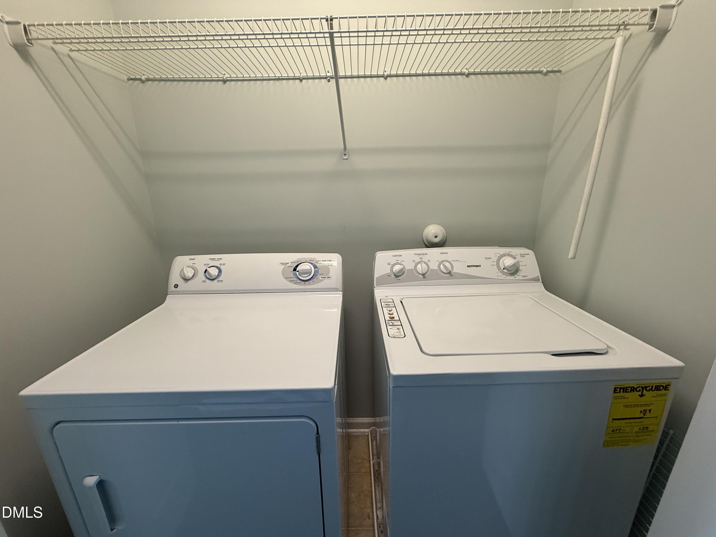 606 Sawcut Lane Apex, NC 27502 - Photo 21 of 30 a utility room with dryer and washer