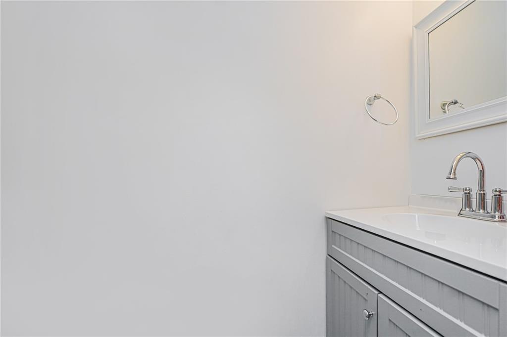 206 Rosedale Avenue Staten Island, NY 10312 - Photo 7 of 19 a bathroom with a sink and vanity