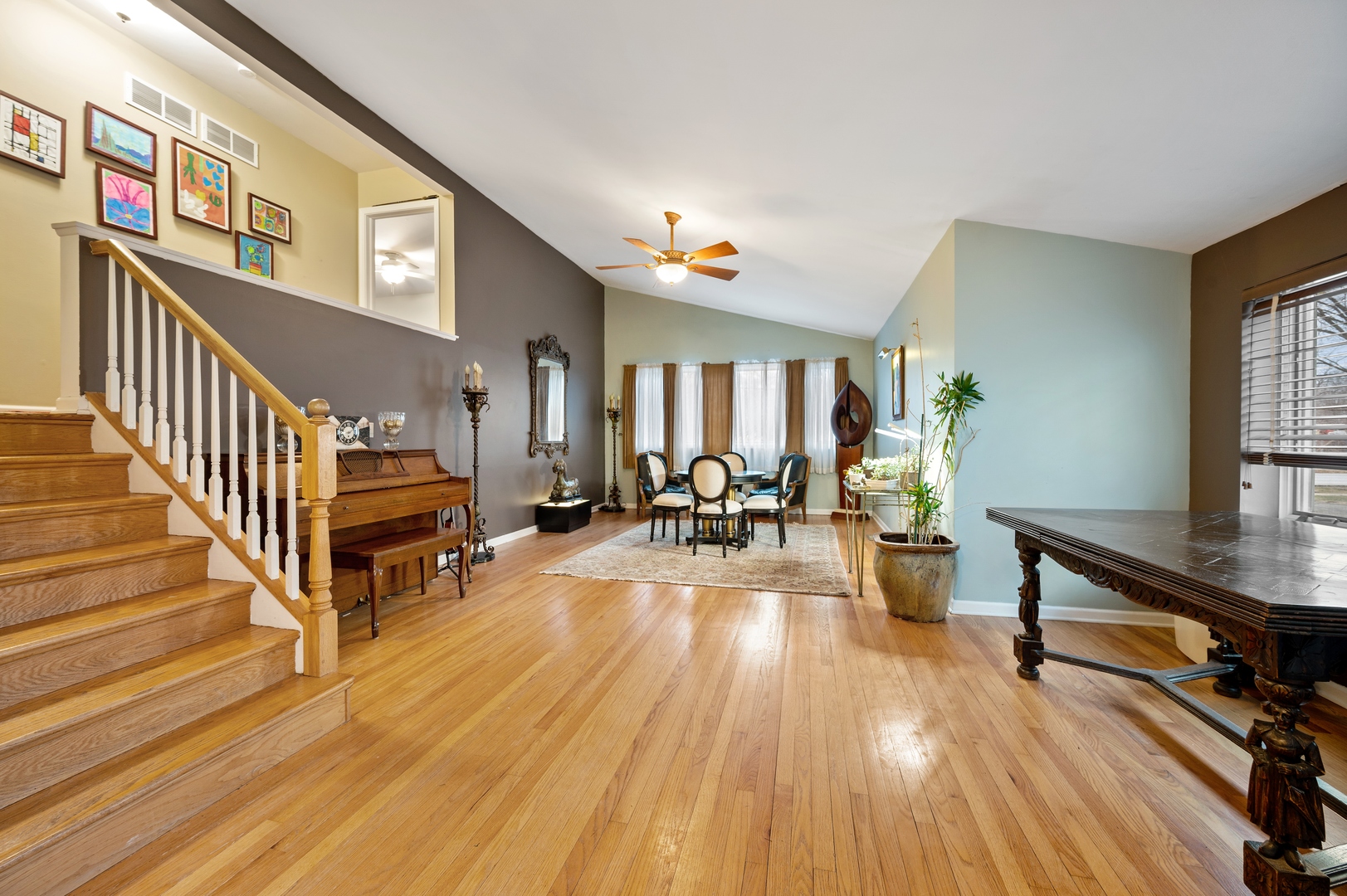 1111 Harms Road Glenview, IL 60025 - Photo 2 of 14 a living room with furniture and a wooden floor