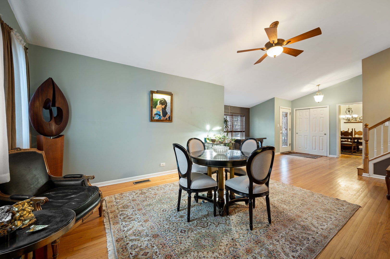 1111 Harms Road Glenview, IL 60025 - Photo 3 of 14 a view of a dining room with furniture