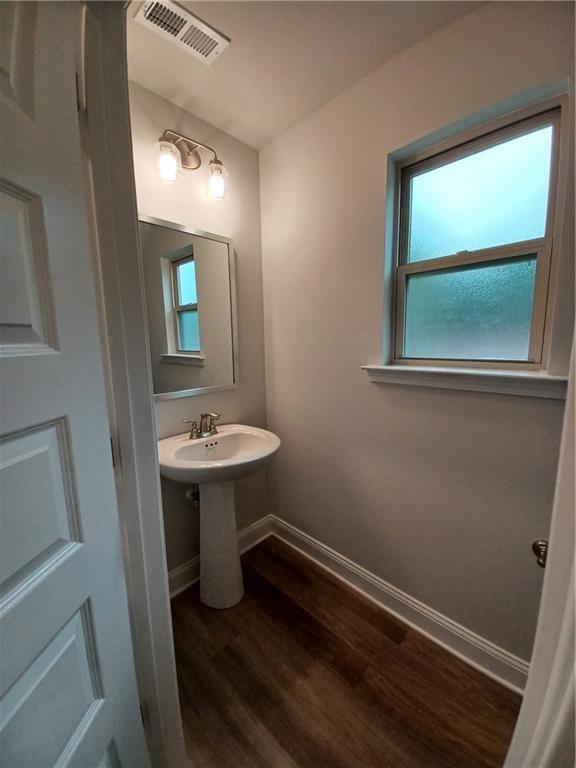 534 Creek Road Cornelia, GA 30531 - Photo 5 of 11 a bathroom with a sink a mirror and a window
