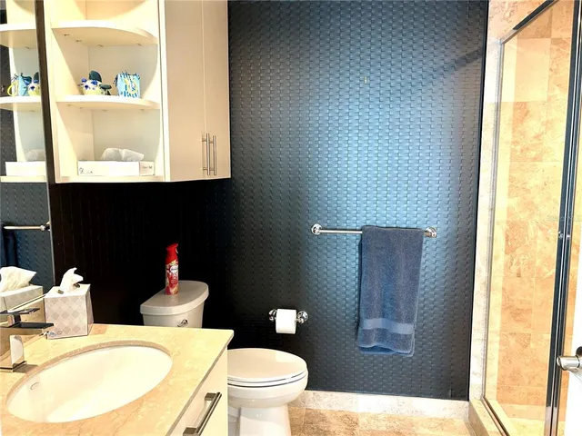 a view of city with tall buildings