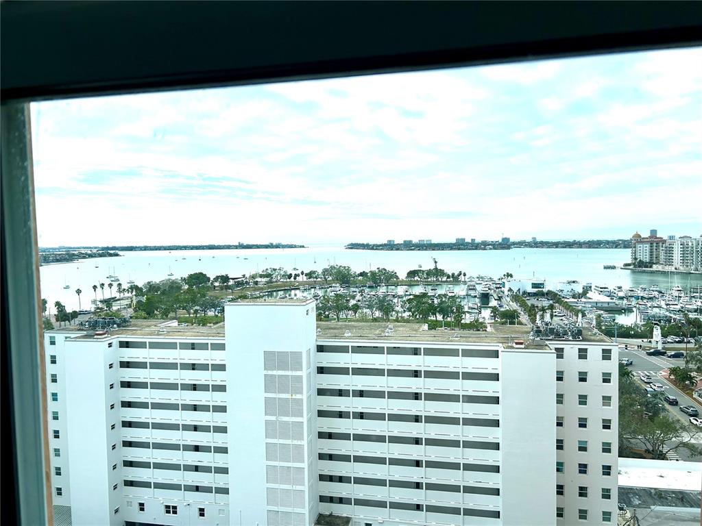 1350 Main Street, Unit 1210 Sarasota, FL 34236 - Photo 23 of 53 a view of a city with tall buildings