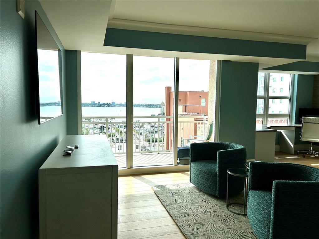 1350 Main Street, Unit 1210 Sarasota, FL 34236 - Photo 28 of 53 a room with a large window