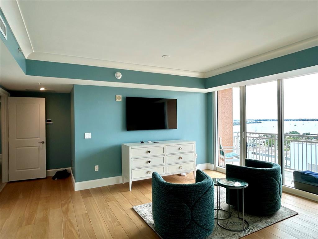 1350 Main Street, Unit 1210 Sarasota, FL 34236 - Photo 29 of 53 a living room with furniture and a flat screen tv
