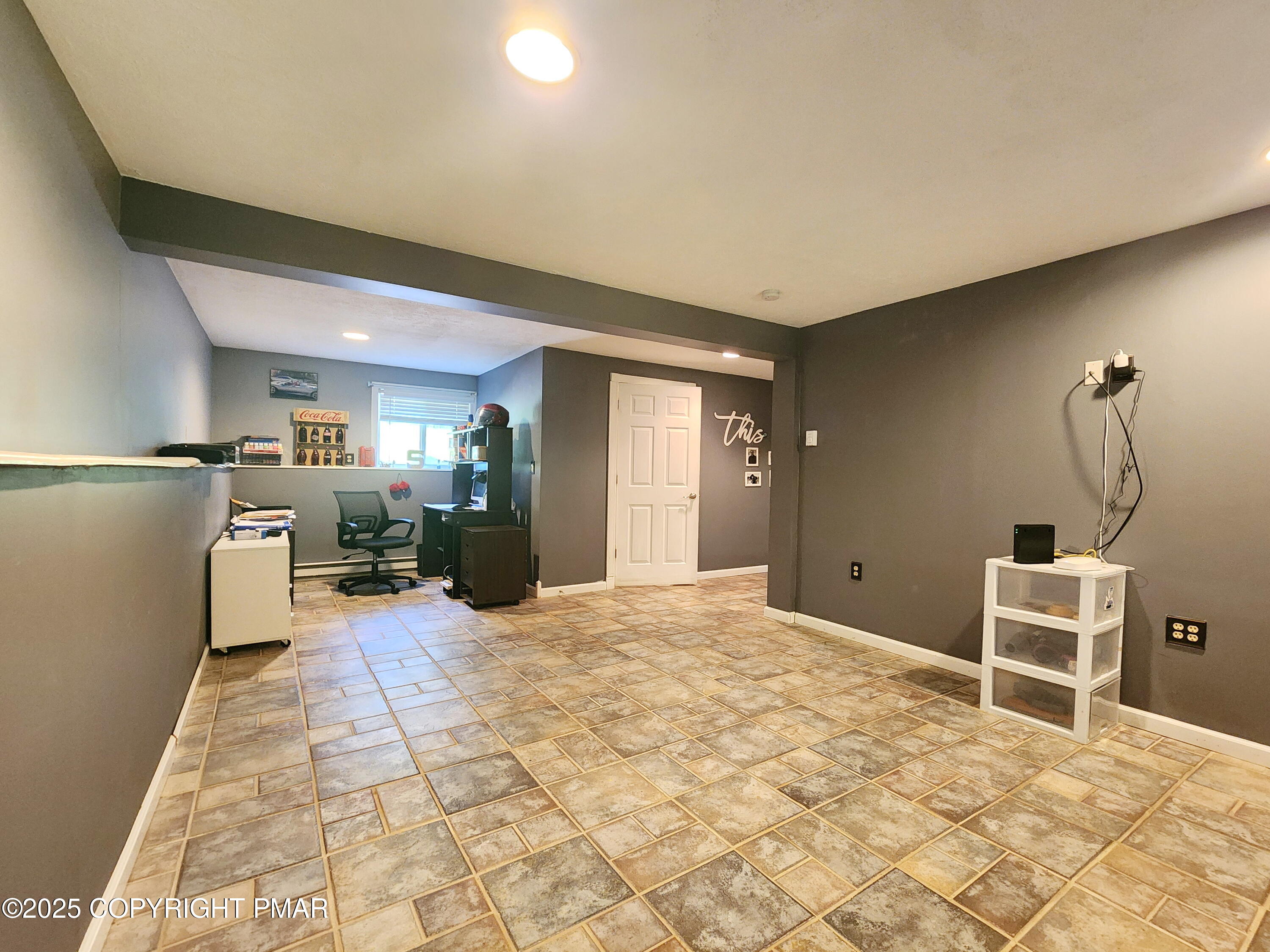 1152 Steele Circle Bushkill, PA 18324 - Photo 14 of 15 a view of a kitchen with furniture and wooden floor