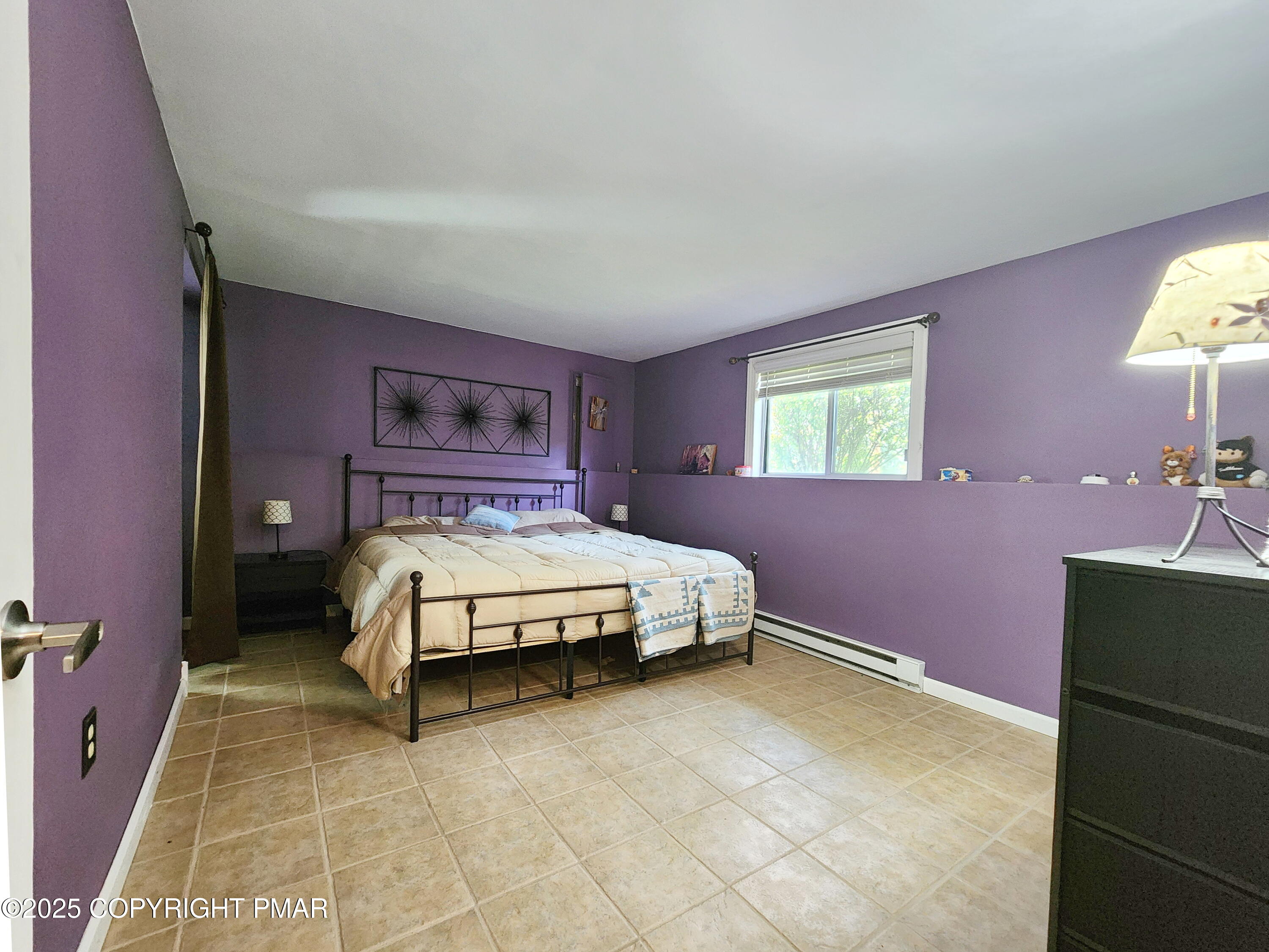 1152 Steele Circle Bushkill, PA 18324 - Photo 5 of 15 a bedroom with a bed and a table
